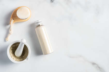 Ubtan natural face mask preparation. Homemade cosmetics. Top view, flat lay.の写真素材