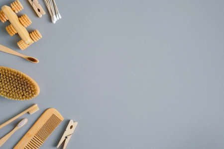 Eco-friendly accessories for personal hygiene on gray background. Flat lay, top view. Zero waste, plastic free concept. Sustainable lifestyle.の写真素材