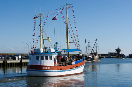 Buesum Town in Northgermany - fishing Boatのeditorial素材