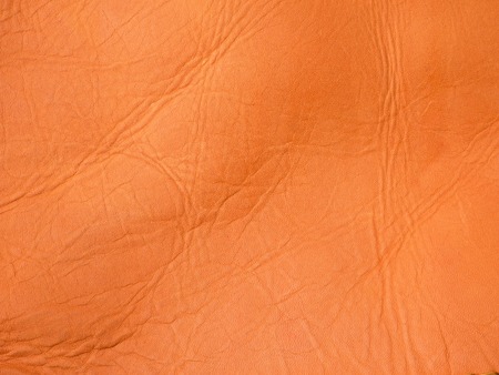 Brown wrinkled genuine leather backgroundの写真素材