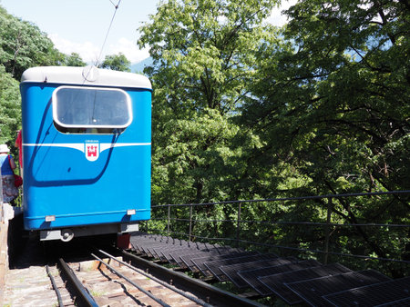 LOCARNO, SWITZERLAND on JULY 2017: Tourist train on funicular railway to Madonna del Sasso church in...