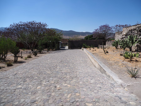 Cobble road in Mitla city at important archeological site of Zapotec culture in Oaxaca state in...