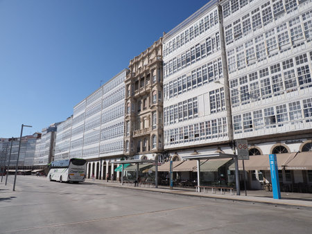 A CORUNA, SPAIN on SEPTEMBER 2019: Galleries buildings on square in european city at Galicia district, clear blue sky in warm sunny summer day.のeditorial素材