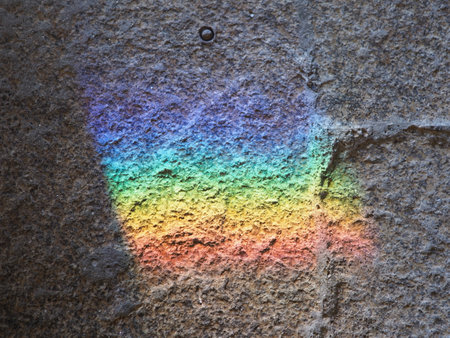 Rainbow on wall of tower of Hercules in european A Coruna city at Galicia district of Spain in 2019 warm sunny summer day on September.の写真素材