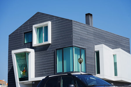 Modern house in european Aveiro city in Portugal, clear blue sky in 2022 warm sunny spring day on...