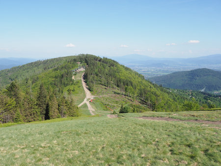 Panoramic Klimczok mount 1 117 m in Silesian Beskids, European Bielsko-Biala city, Poland, clear blue sky in 2018 warm sunny spring day on May.の写真素材