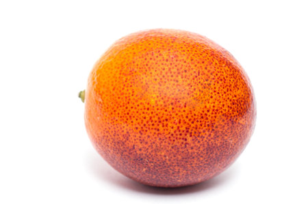 Citrus fruit blood orange in front of a white background
