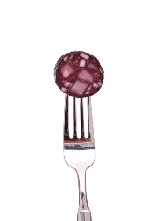 White isolated slice blood sausage on a forkの写真素材