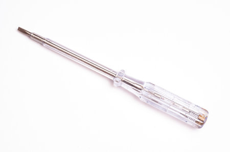 Monopolar screwdriver with voltage tester
