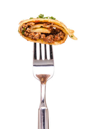 Pancake with mincemeat on a forkの写真素材