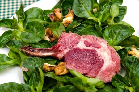 Lamb chop on corn lettuce の写真素材