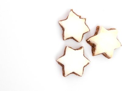 Star shaped cinnamon cookies on white backgroundの写真素材