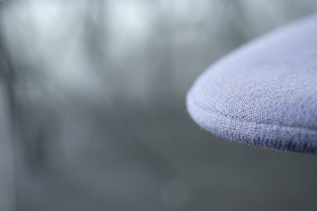 Close up blue chair chushion in a office with blurred bokeh