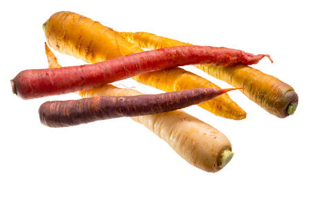 Vegetable carrots raw white isolatedの写真素材