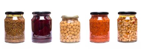 Lentils beans chickpeas and carrost in a glasses white isolatedの写真素材