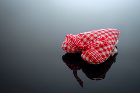 Red white checked fabric with ribbon close-up