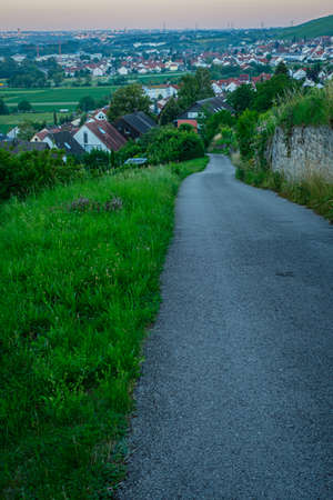 Roald and meadow with homes in dawn vertical formatの写真素材