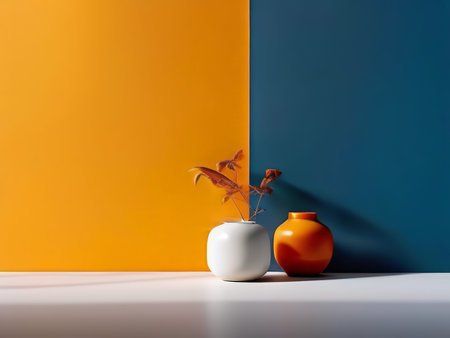 Vibrant Contrast in Still Life Composition Dried Flowers, Orange Jar Against Bold Yellow and Blue Backgroundの素材