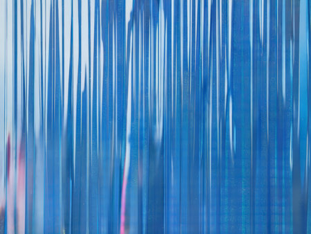 Vibrant Blue Gradient Background - Blurry Image Captures Calmness and Tranquilityの素材