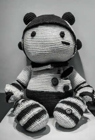 Crochet Panda in Overalls A Textured BlackandWhite Pandemic Storytellerの素材
