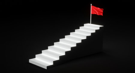 A triumphant red flag atop stairs, representing reaching new heights and achieving successの素材
