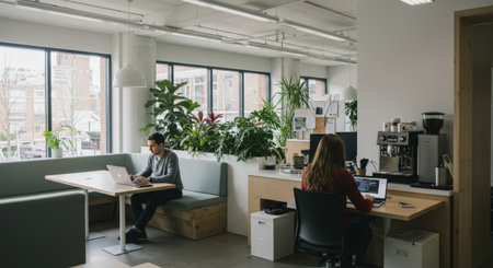 A vibrant, productive workspace featuring lush greenery, ample sunlight, and ergonomic furniture, promoting creativity and teamwork within an openplan environmentの素材