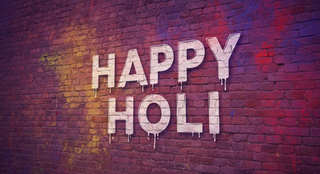 A vibrant Happy Holi mural adorns a red brick wall, splattered with cheerful paint drips, celebrating the festival of colorsの素材