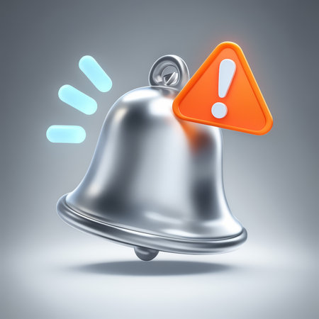A metallic bell with a red exclamation mark symbolizes an urgent alert or warning.の素材