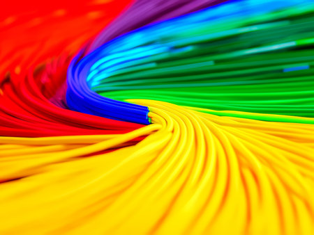 A vibrant display of multicolored cables swirling in a dynamic pattern.の素材