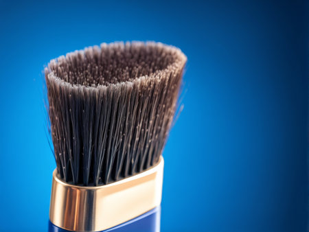 Brush for painting on a blue background. Shallow depth of fieldの素材