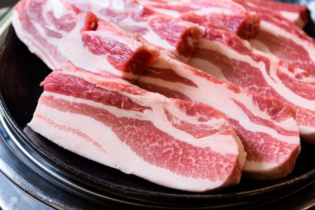 Pork belly on hot pot for Sukiyaki japanese food