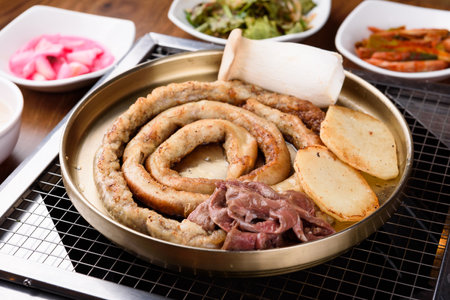 Grilled beef entrails on a grill.の写真素材