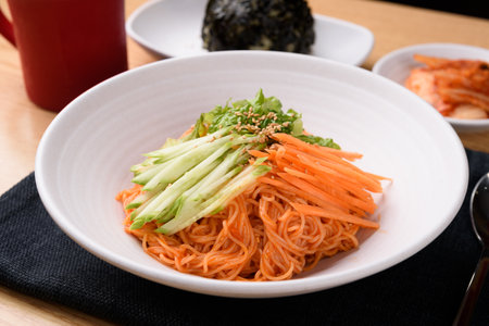 Korean Jjolmyeon is a Korean noodle dish characterized by chewy noodles and spicy seasoning.の写真素材