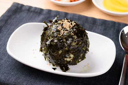 Round seaweed powdered rice balls sprinkled with sesame seedsの写真素材