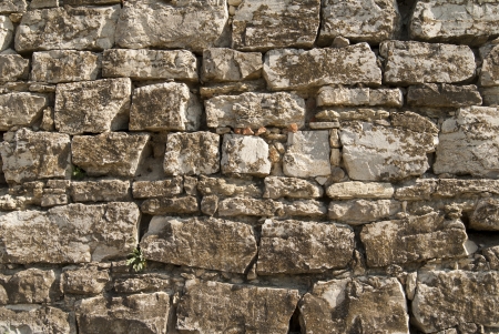ancient brick fortress wall backgroundの写真素材