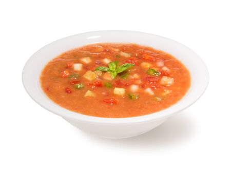 Traditional spanish cold gazpacho soup in a bowl on a white backgroundの写真素材