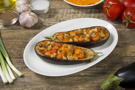 Eggplant stuffed with meat and vegetables and baked with cheese. Selected focus.の写真素材