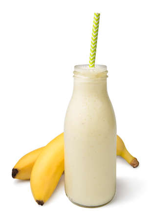 Banana chocolate smoothie in a glass bottle with ingredient Isolated on a white backgroundの写真素材