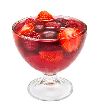Strawberry, cherry and raspberry jelly in a ice cream bowl, isolated on a white background....