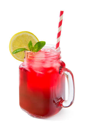 Strawberry, raspberry and cherry lemonade in a glass jar on a white background.の写真素材