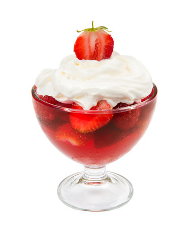 Strawberry and raspberry jelly in a ice cream bowl with whipped cream, isolated on a white background. close-up.の写真素材