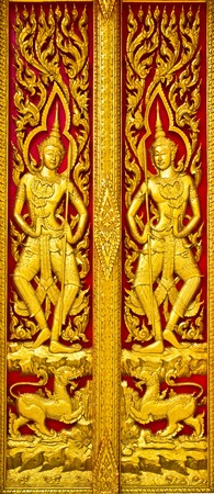 Postcard angel carvings door  church.の写真素材