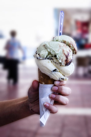 ice cream in a waffle in the handの写真素材