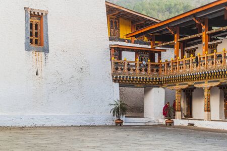 Two buddhist monks at Punakha Dzong, Bhutanの写真素材
