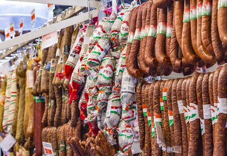 Budapest, Hungary - 10 October 2019: Pick salami in shop in the Great Market Hall in Budapest. Famous Hungarian salami, the most popular souvenir from Hungary.の写真素材