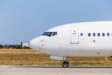 Kharkov / Ukraine - August 19, 2018: Nose of Airbus A319 closeup of FANair in Kharkov Airport, pilot...