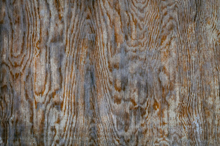 Gray brown wooden weathered desk board texture. Abstract background, empty template, text space.