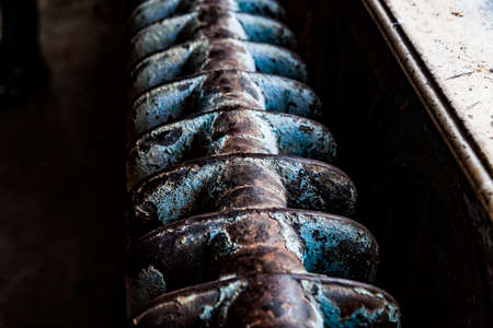 Old vintage rusty radiator. Concept of roblem of winter house heating. Poor heating in old housesの写真素材