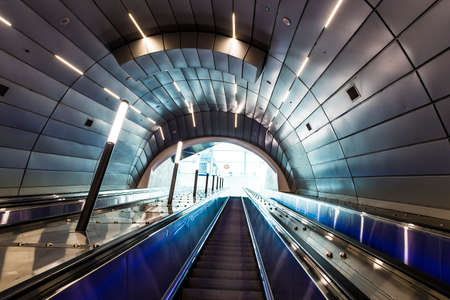 Jerusalem, Israel - 5 August 2019. The modern escalator with blue backlight of the new train station Jerusalem Yitzhak Navon, the world's deepest heavy-rail passenger station.のeditorial素材