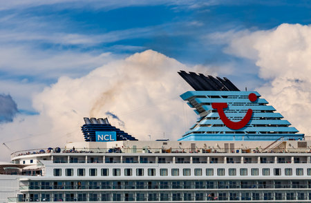 Corfu, GREECE, August 2022. working exhaust pipes of a cruise ship operated by TUI UK docked at the cruise terminal of the Kerkyra. environmental pollution.のeditorial素材